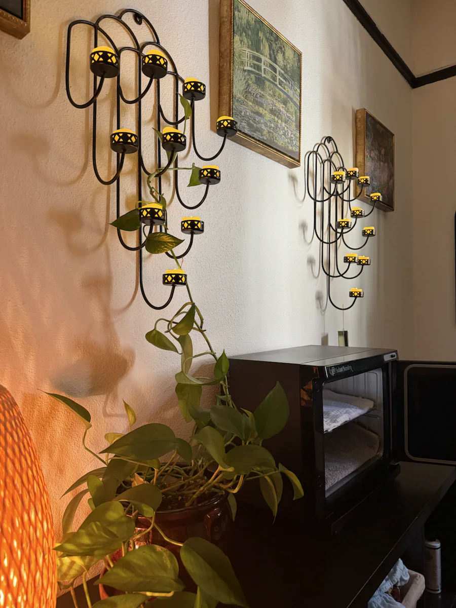 A warm, quiet treatment-room detail that supports a gentle transition back into the day.