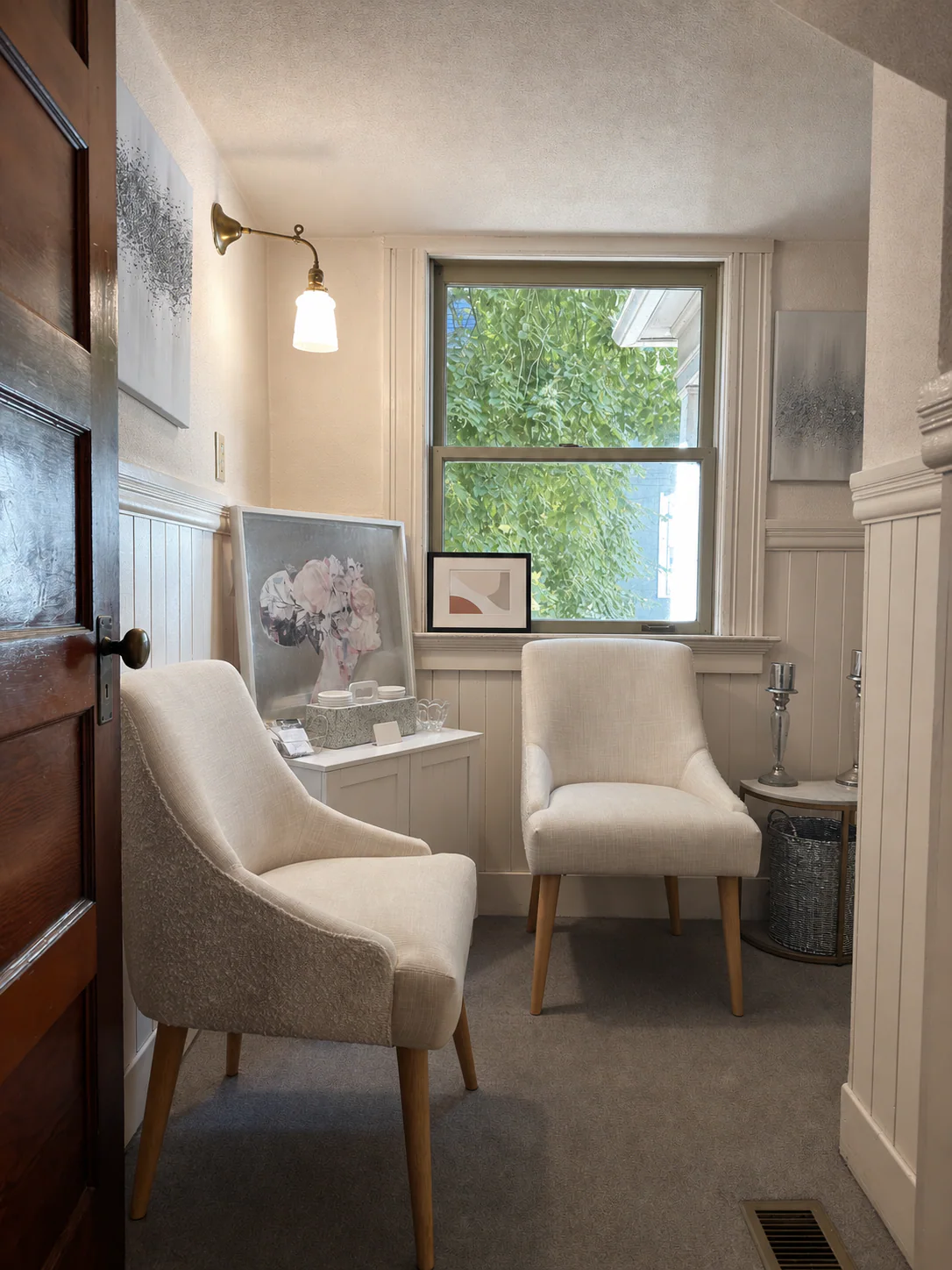 The warm, light-filled waiting space at The Home Within.